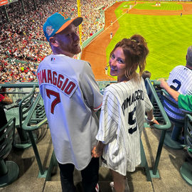 Alexander Dimaggio shares a moment at the ballpark