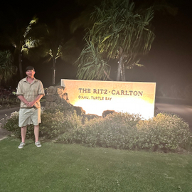 Alexander Dimaggio stands outside The Ritz-Carlton